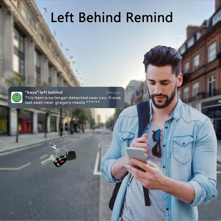 Man using a smartphone with an app notification about keys left behind on a city street.